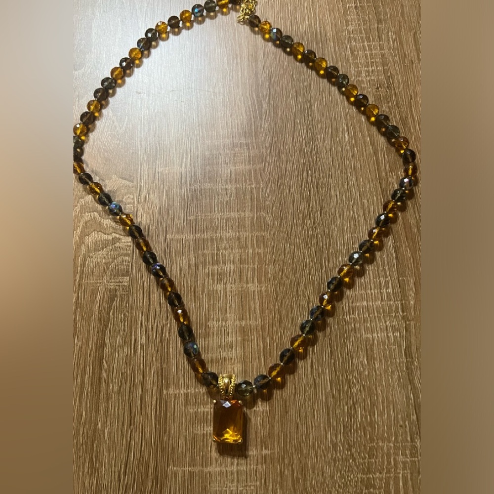 Long amber colored Joan river large pendant glass